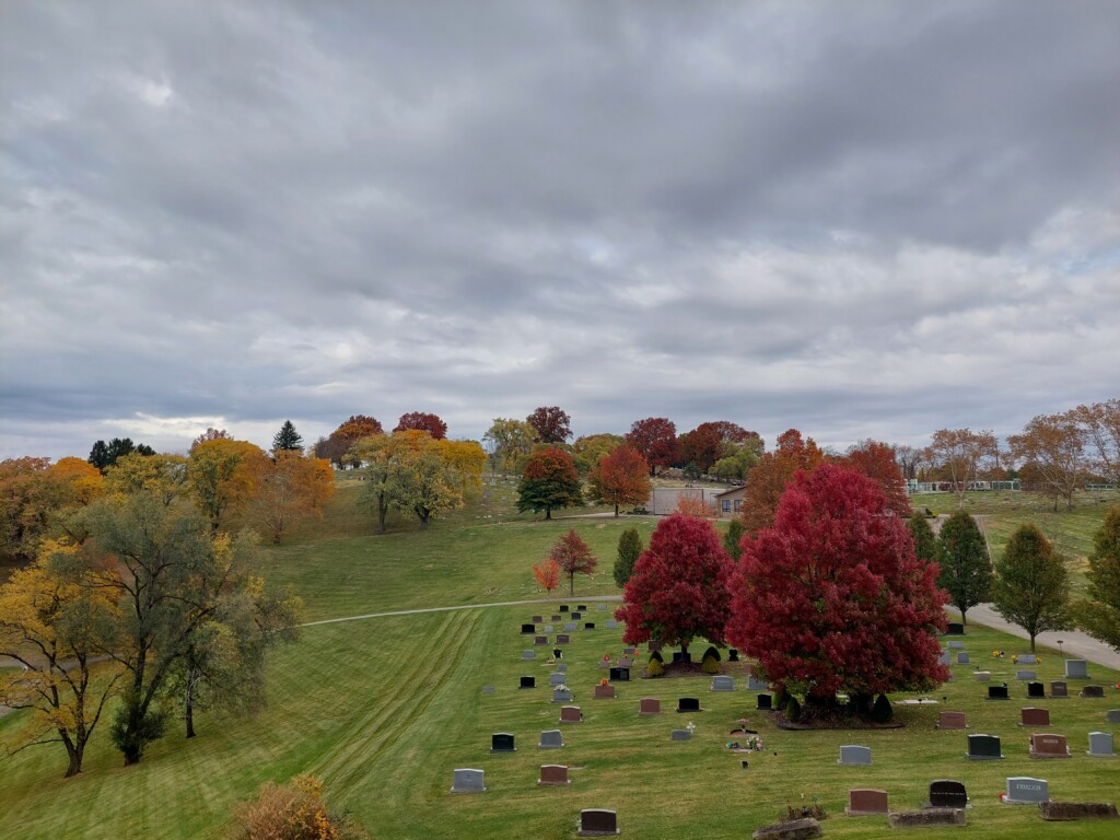 Photo of a cemetery during fall